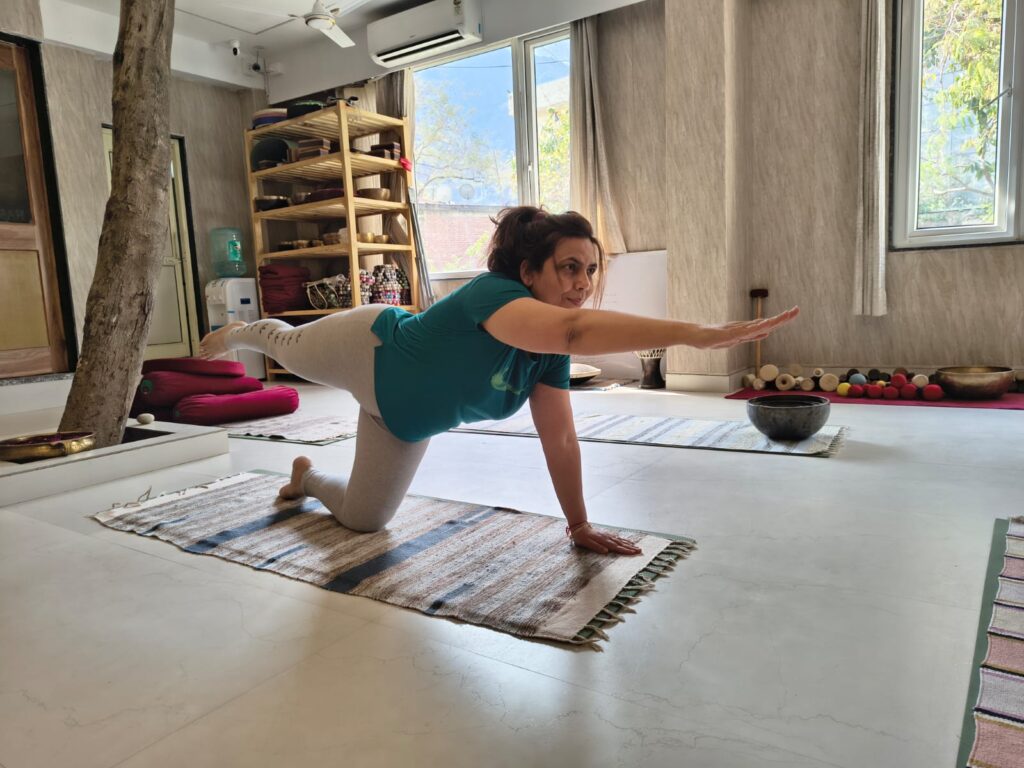 Founder-Anupama Monga performing yoga-UK.png